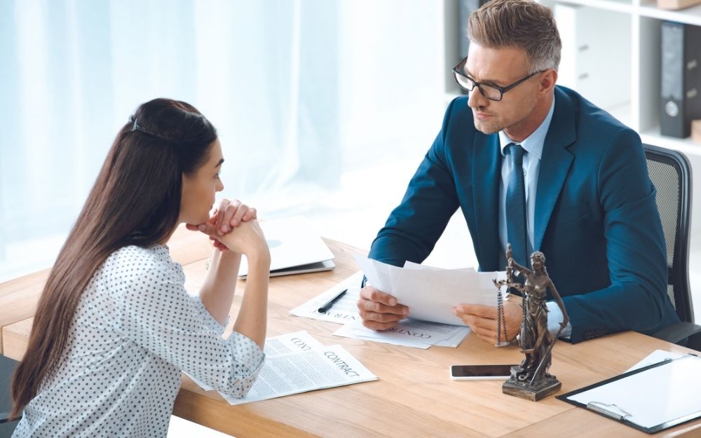woman consulting with a lawyer