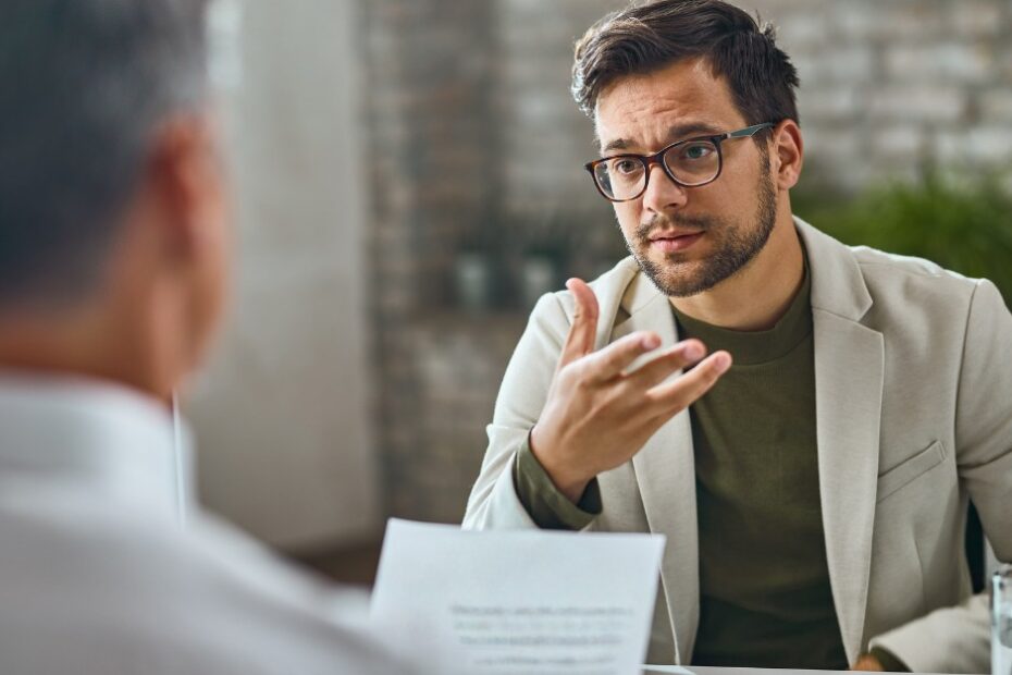 Man talking to his lawyer about a QP9