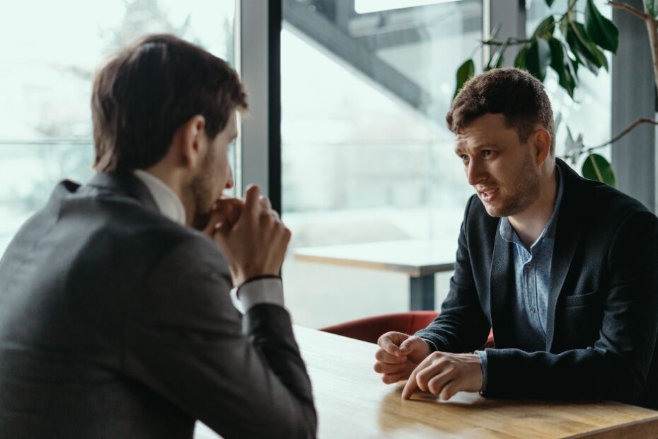 Man talking to a lawyer about the defence of mistake of fact in Queensland